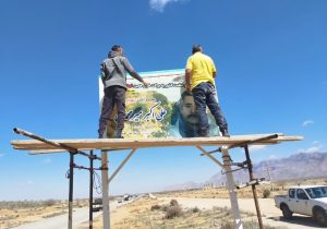 غبار روبی یادمان محیط‌بان شهید علی اکبر میرمحمدی در میان‌جنگل فسا