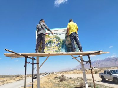 غبار روبی یادمان محیط‌بان شهید علی اکبر میرمحمدی در میان‌جنگل فسا