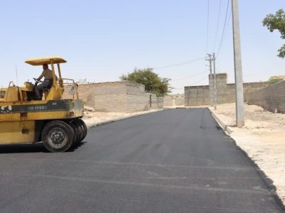 اجرای آسفالت معابر روستای بختیارویه توسط بنیاد مسکن انقلاب اسلامی 